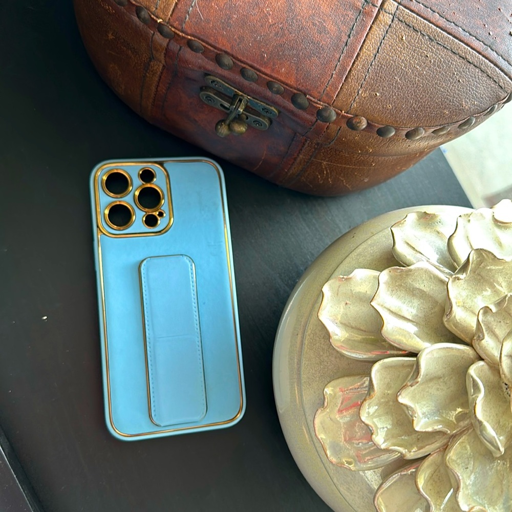 iPhone 14 pro max cover baby blue with gold and magnetic holder/stand